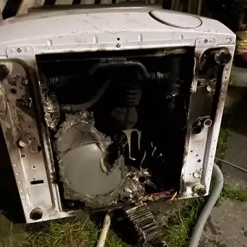 Brent vaskemaskin med teknisk feil